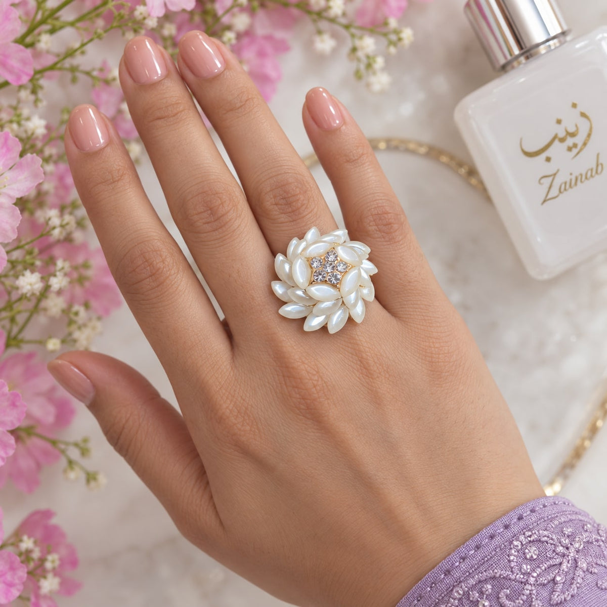 Ivory Petal Statement Ring - styled model view - House of Zainab